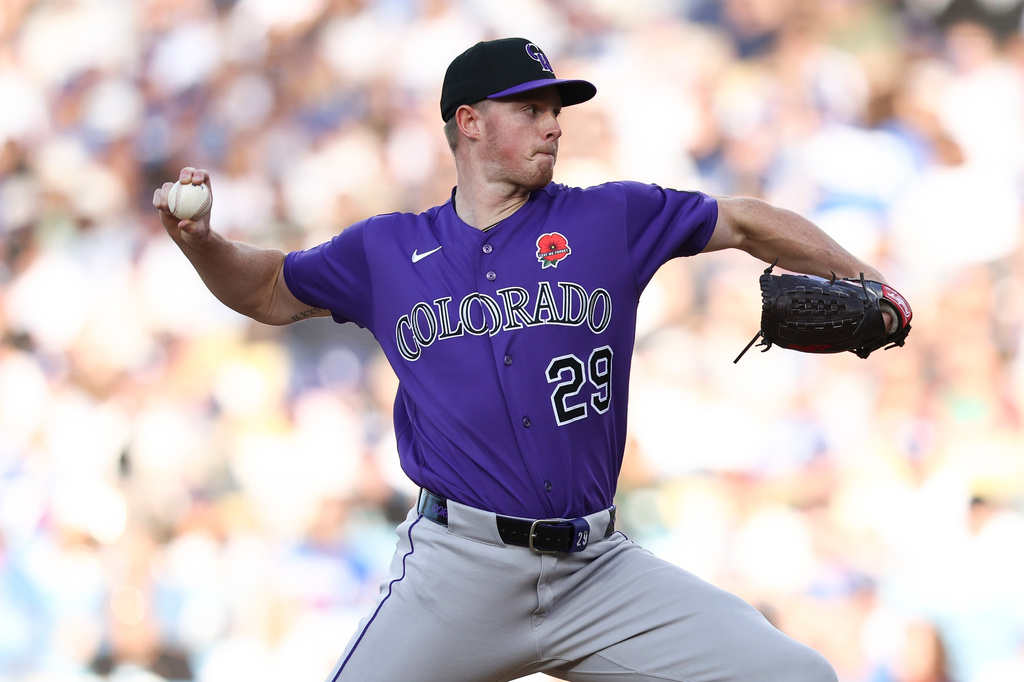 Colorado Rockies pitcher Tanner Gordon throws to a Los Angeles Dodgers batter during the first inning of a baseball game, Monday, May 25, 2026, in Los Angeles. (AP Photo/Jessie Alcheh)