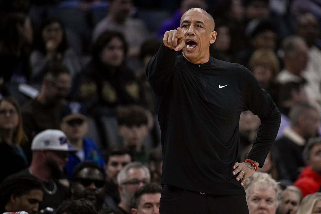 Sacramento Kings head coach Doug Christie shouts to his players during the first half of an NBA basketball game against the Orlando Magic in Sacramento, Calif., Thursday, Feb. 19, 2026. (AP Photo/Randall Benton)