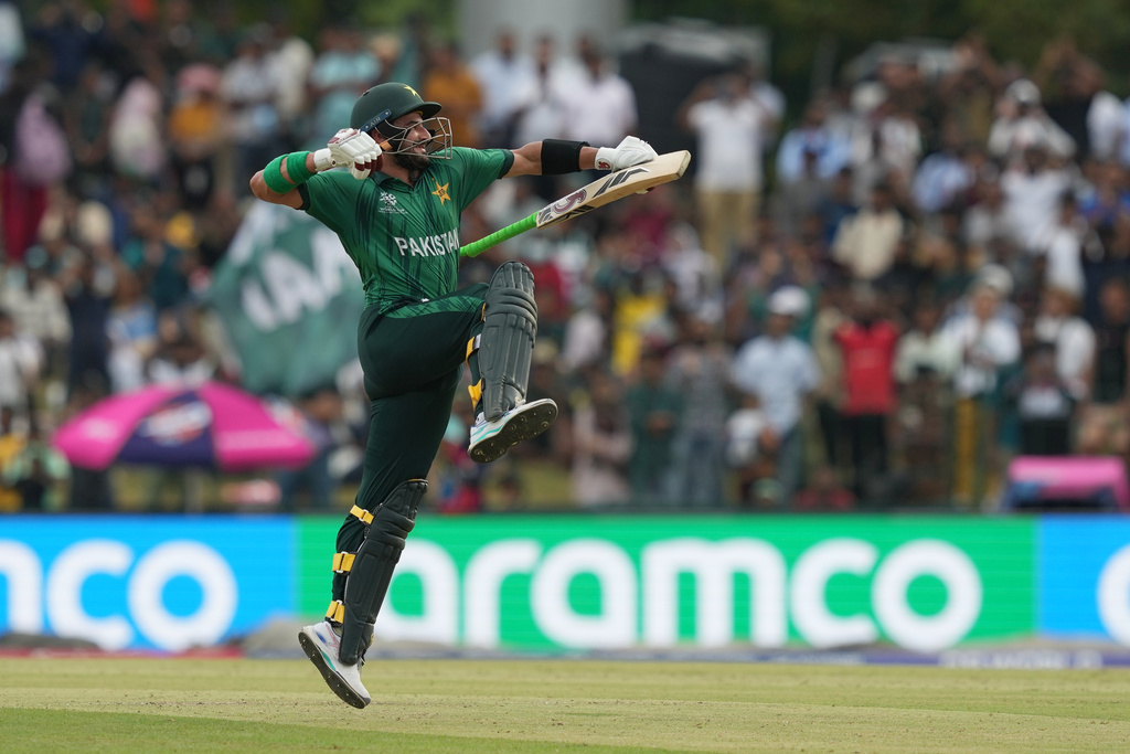 Pakistan's Sahibzada Farhan celebrates his century during the T20 World Cup cricket match between Namibia and Pakistan in Colombo, Sri Lanka, Wednesday, Feb. 18, 2026. (AP Photo/Eranga Jayawardena)