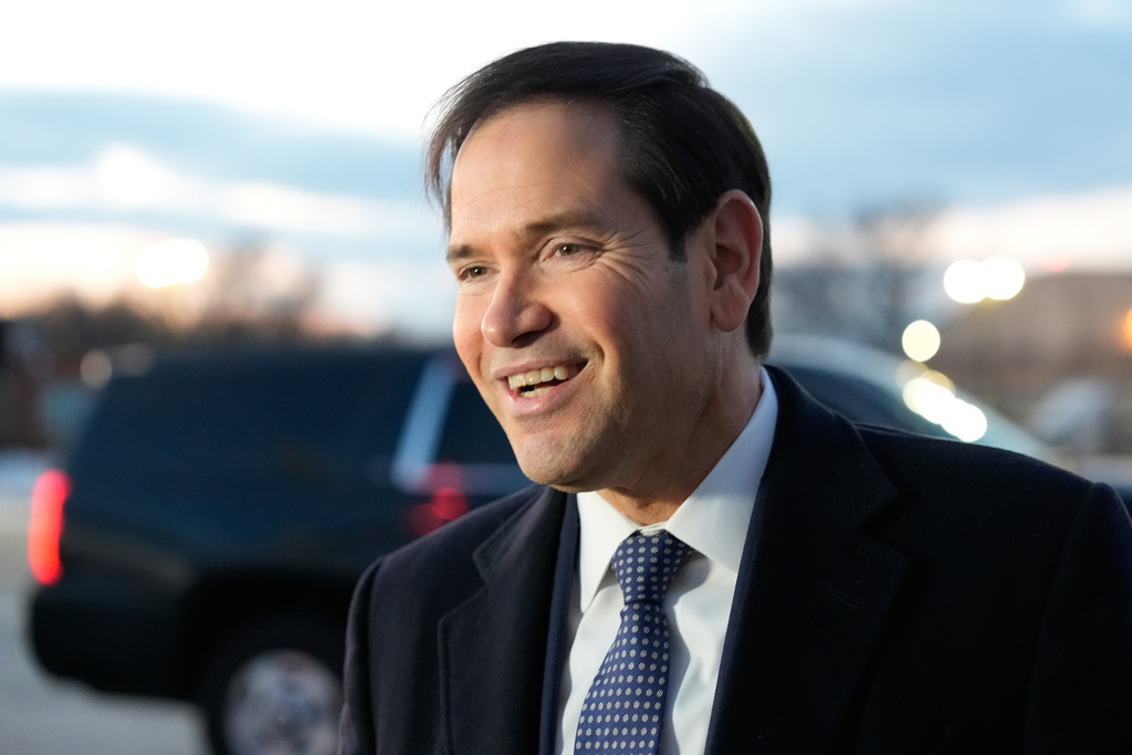 Secretary of State Marco Rubio speaks to reporters before boarding his plane, Thursday, Feb. 12, 2026, at Joint Base Andrews, Md., en route to the Munich Security Conference. (AP Photo/Alex Brandon, Pool)