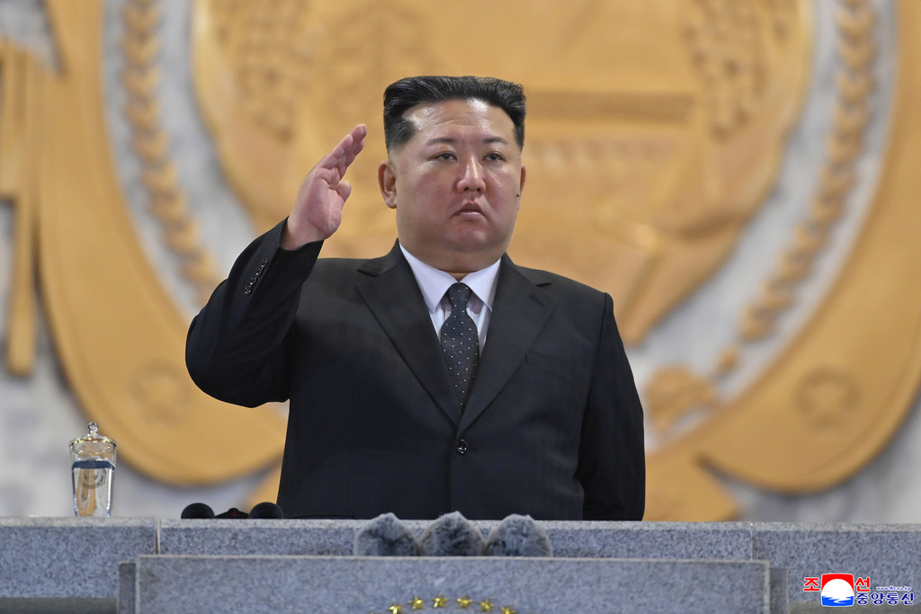 In this photo provided by North Korean government, North Korean leader Kim Jong Un attends the military parade marking the 80th anniversary of the founding of the ruling Worker's Party, in Pyongyang, North Korea, Friday, Oct. 10, 2025. Independent journalists were not given access to cover the event depicted in this image distributed by the North Korean government. The content of this image is as provided and cannot be independently verified. Korean language watermark on image as provided by source reads: "KCNA" which is the abbreviation for Korean Central News Agency. (Korean Central News Agency/Korea News Service via AP)