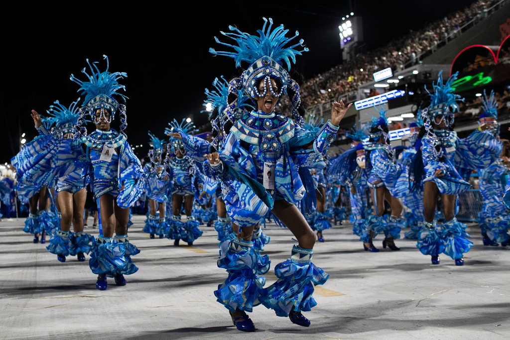 Performers from the Portela samba school parade during Carnival celebrations at the Sambadrome in Rio de Janeiro, early Monday, Feb. 16, 2026. (AP Photo/Bruna Prado)