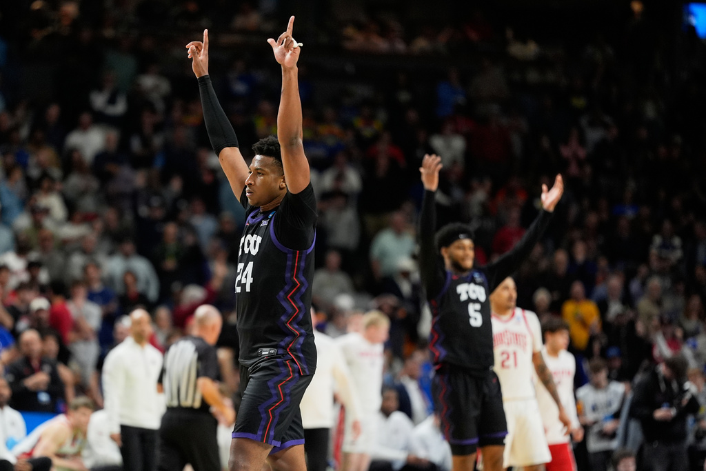 TCU forward Xavier Edmonds celebrates after their win against Ohio State in the first round of the NCAA college basketball tournament, Thursday, March 19, 2026, in Greenville, S.C. (AP Photo/Chris Carlson)
