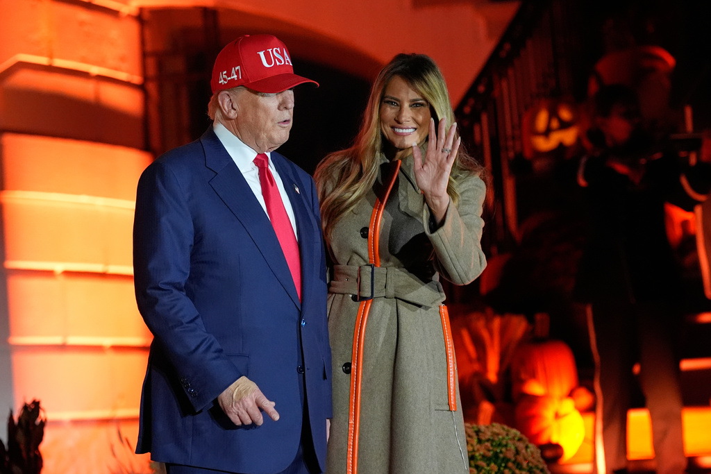 President Donald Trump and first lady Melania Trump participate in a Halloween at the White House event on the South Lawn, Thursday, Oct. 30, 2025, in Washington. (AP Photo/Alex Brandon)