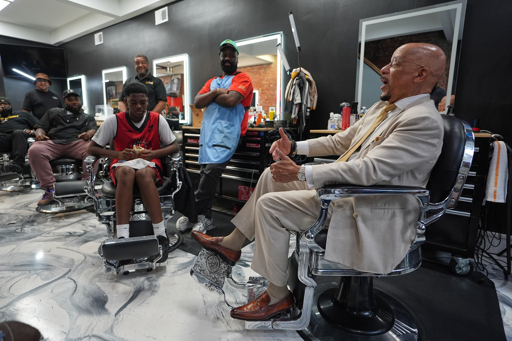 Pennsylvania State Sen. Vincent Hughes, right, speaks at Philly Cuts in Philadelphia speaks, Friday, Aug. 21, 2026, during a discussion facilitated by Win With Black Men. (AP Photo/Matt Rourke)