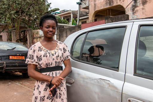 Neh Favour Wenazie, a student at the Advanced School of Mass Communication, poses in the Acacia neighborhood, Yaoundé, Cameroon, Sept. 12, 2025. (AP Photo / Welba Yamo Pascal) Neh Favour Wenazie, a student at the Advanced School of Mass Communication, poses in the Acacia neighborhood, Yaoundé, Cameroon, Sept. 12, 2025. (AP Photo / Welba Yamo Pascal)