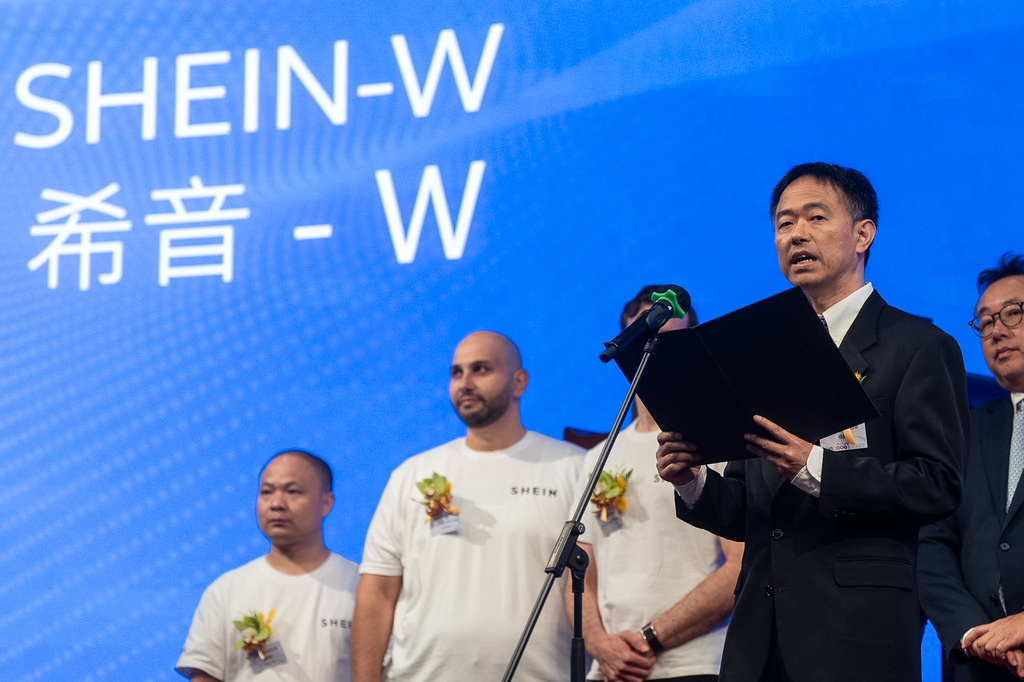 Leigh Gui, Chief Financial Officer of fast-fashion online retailer Shein, speaks at the listing ceremony in Hong Kong, Tuesday, Sept. 1, 2026. (AP Photo/Chan Long Hei)