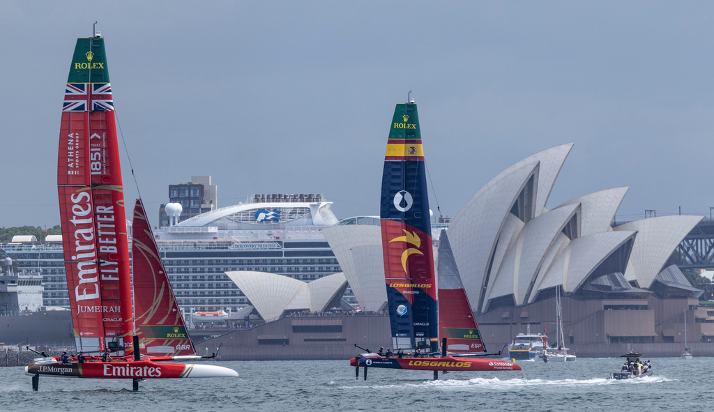 Tom McGowan takes part in a sixth sailor experience on board the Los Gallos SailGP Team in front of the Sydney Opera House and the Emirates Great Britain SailGP Team on Race Day 1 of the KPMG Australia Sail Grand Prix in Sydney, Australia. Saturday Feb.28, 2026. (Brett Phibbs/ SailGP via AP)