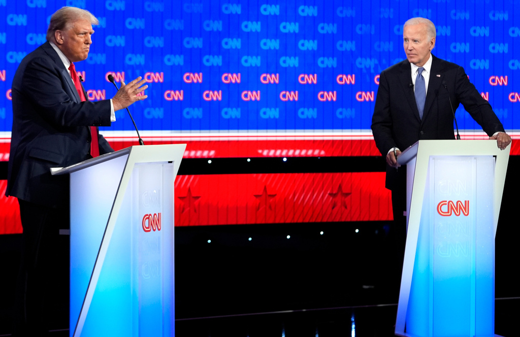 FILE - President Joe Biden, right, and Republican presidential candidate former President Donald Trump, left, participate in a presidential debate hosted by CNN, Thursday, June 27, 2024, in Atlanta. (AP Photo/Gerald Herbert)