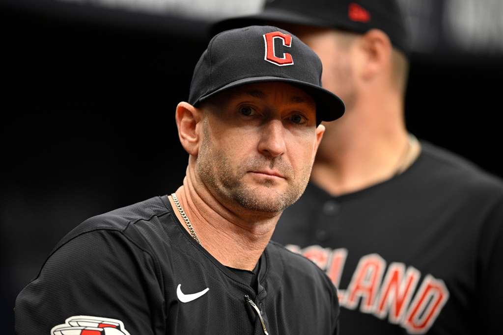 FILE - Cleveland Guardians bench coach Craig Albernaz looks on from the dugout before a baseball game against the Tampa Bay Rays, July 14, 2024, in St. Petersburg, Fla. (AP Photo/Phelan M. Ebenhack, File)