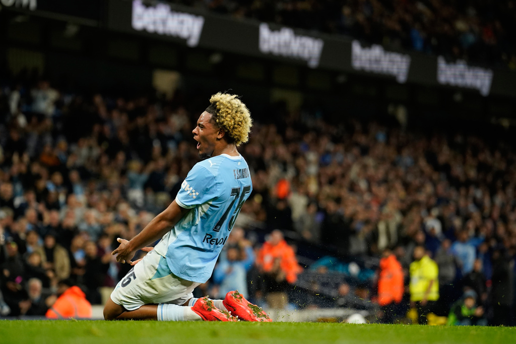 Manchester City's Floyd Samba celebrates after scoring first goal during the third-round English League Cup soccer match between Manchester City and Norwich City in Manchester, England, Thursday, Sept. 17, 2026. (AP Photo/Dave Thompson