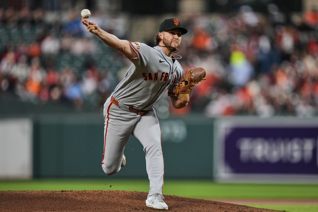 San Francisco Giants starting pitcher Landen Roupp delivers during the first inning of a baseball game against the Baltimore Orioles, Friday, April 10, 2026, in Baltimore. (AP Photo/Stephanie Scarbrough)