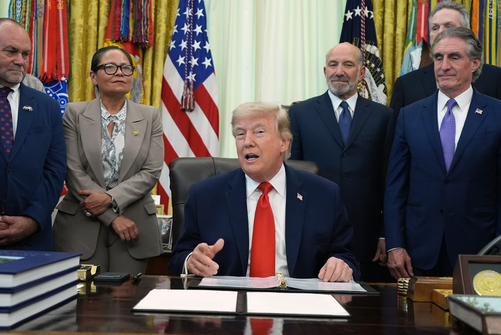 President Donald Trump speaks before signing a proclamation about the fishing industry, in the Oval Office of the White House, Thursday, June 11, 2026, in Washington. (AP Photo/Jacquelyn Martin)