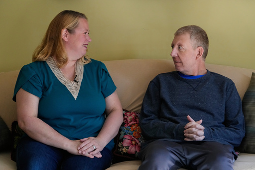 Martha Swick, left, and her husband Bill Swick look at each other at their home in Minooka, Ill., Friday, Oct. 24, 2025. (AP Photo/Nam Y. Huh) Martha Swick, left, and her husband Bill Swick look at each other at their home in Minooka, Ill., Friday, Oct. 24, 2025. (AP Photo/Nam Y. Huh)