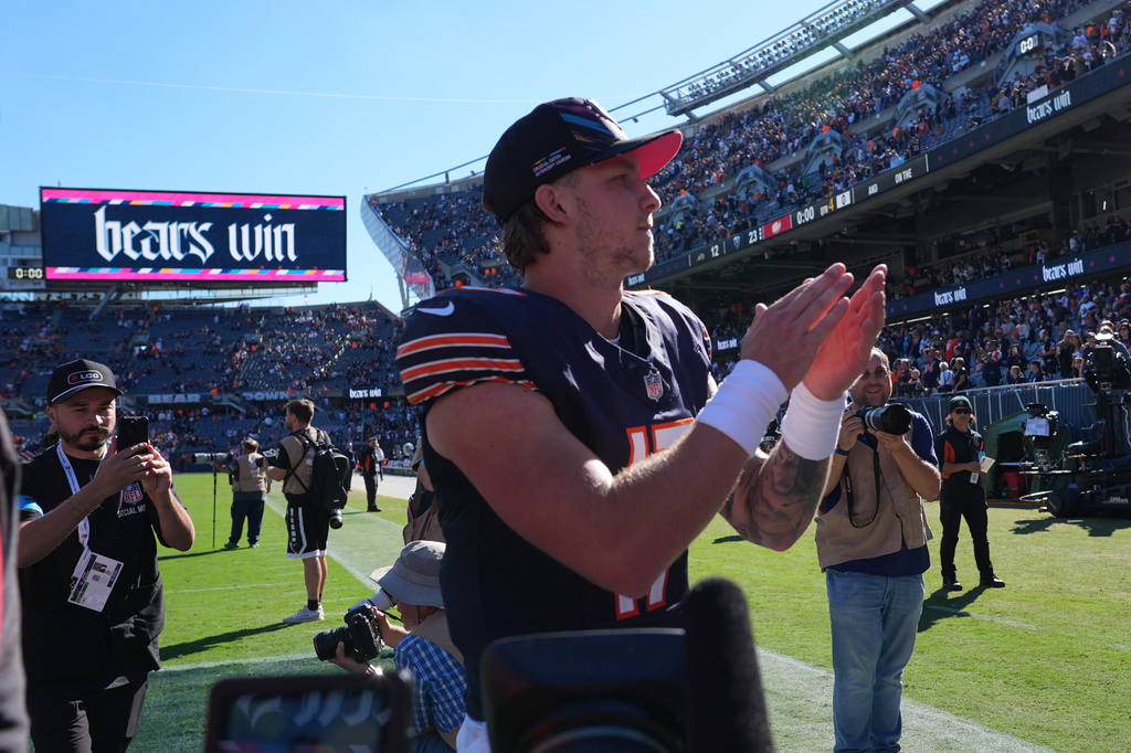Chicago Bears quarterback Tyson Bagent celebrates a victory over the New York Jets as he walks off the field following an NFL football game Sunday, Oct. 4, 2026, in Chicago. (AP Photo/Nam Y. Huh)