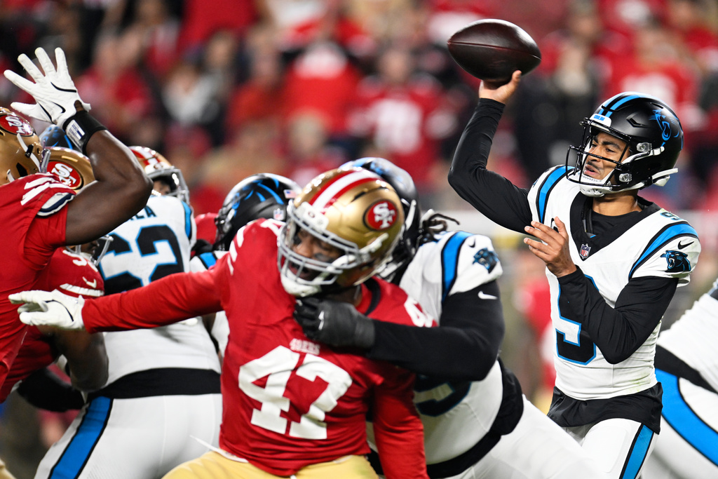 Carolina Panthers quarterback Bryce Young passes against the San Francisco 49ers during the first half an NFL football game, Monday, Nov. 24, 2025, in Santa Clara, Calif. (AP Photo/Eakin Howard)