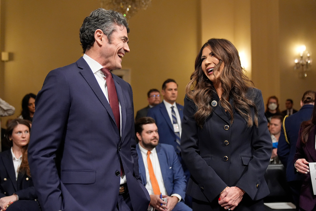 FILE - Joseph Kent, director of the National Counterterrorism Center and Homeland Security Secretary Kristi Noem appear before the House Committee on Homeland Security on Capitol Hill in Washington, Dec. 11, 2025. (AP Photo/Mark Schiefelbein, File)