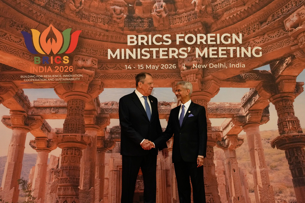 India's Foreign Minister S.Jaishankar, right, shakes hands with Russia's Foreign Minister Sergey Lavrov as he arrives for a two-day BRICS nations meeting in New Delhi, India, Thursday, May 14, 2026. (AP Photo/Manish Swarup)