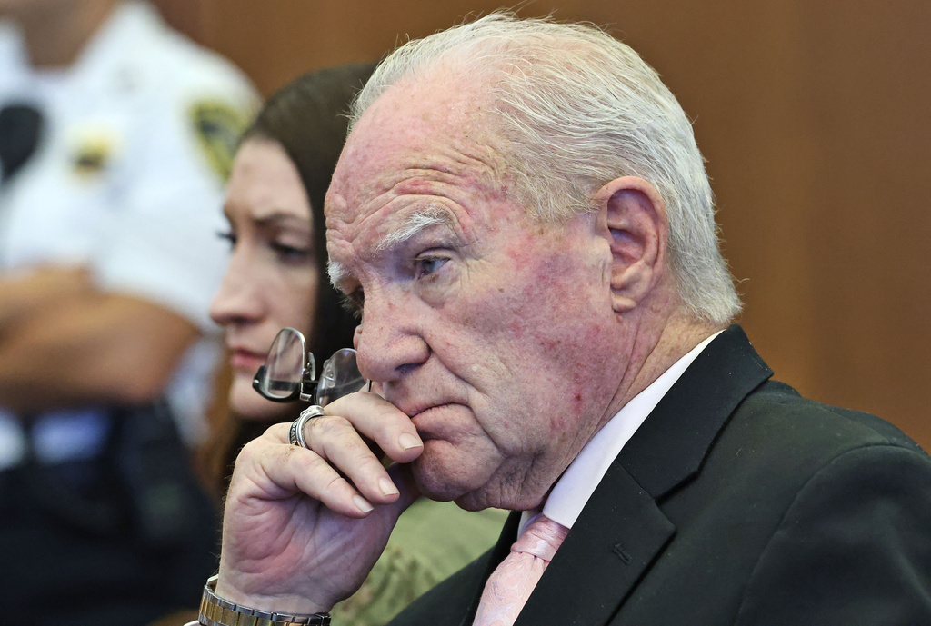 Defense attorney Kevin Reddington and defendant Lindsay Clancy listen to Judge William Sullivan speak with the jury after declaring a mistrial at court in Plymouth, Mass., on Friday, Sept. 4, 2026. (Greg Derr/The Patriot Ledger via AP, Pool)