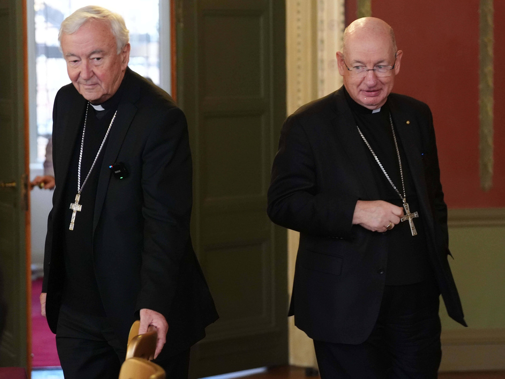 Outgoing archbishop of Westminster Cardinal Vincent Nichols and Bishop Richard Moth arrive for a press conference announcing Bishop Moth as the new Archbishop, replacing Cardinal Nichols as the leader of the Catholic Church in England and Wales, in the Throne Room of Archbishop's House, Westminster, London, Friday, Dec. 19, 2025. (Jonathan Brady/PA via AP)
