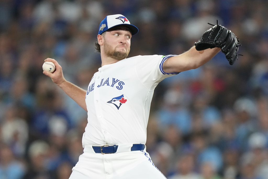 Toronto Blue Jays pitcher Trey Yesavage delivers against the Seattle Mariners during the first inning of Game 6 of baseball's American League Championship Series in Toronto, Sunday, Oct. 19, 2025. (Nathan Denette/The Canadian Press via AP)