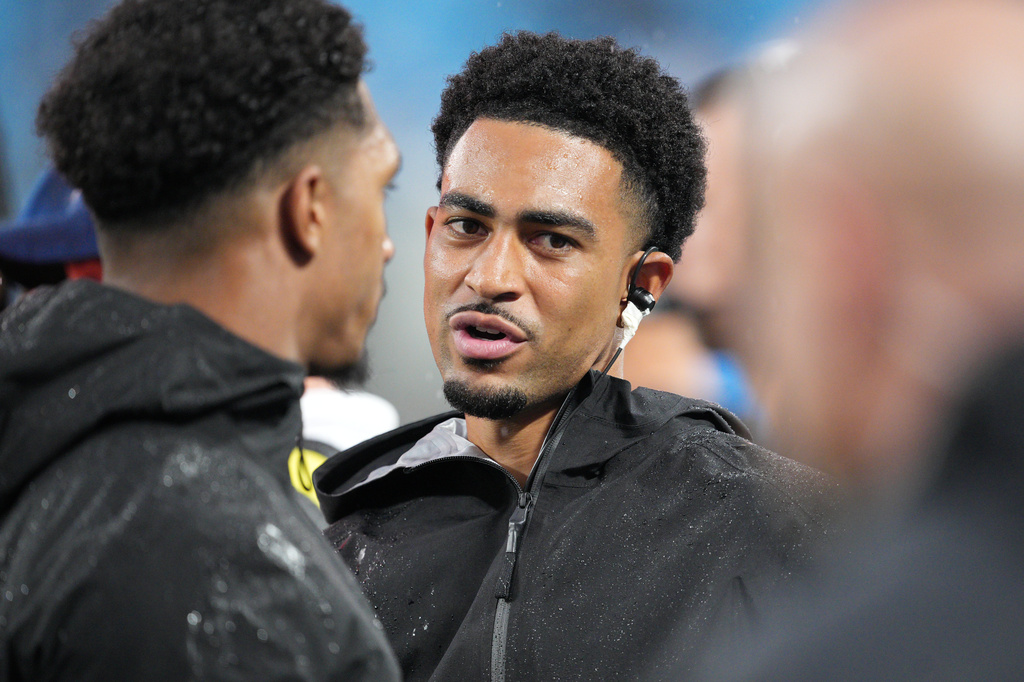 Carolina Panthers quarterback Bryce Young watches during the first half of an NFL preseason football game against the Houston Texans, Friday, Aug. 28, 2026, in Charlotte, N.C. (AP Photo/Jacob Kupferman)