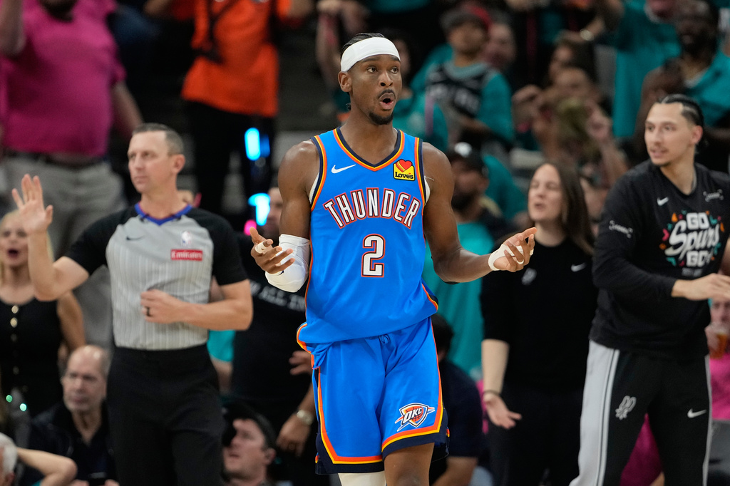 Oklahoma City Thunder guard Shai Gilgeous-Alexander (2) reacts during the second half of Game 3 in the Western Conference finals NBA basketball playoffs series against the San Antonio Spurs Friday, May 22, 2026, in San Antonio. (AP Photo/Ashley Landis)