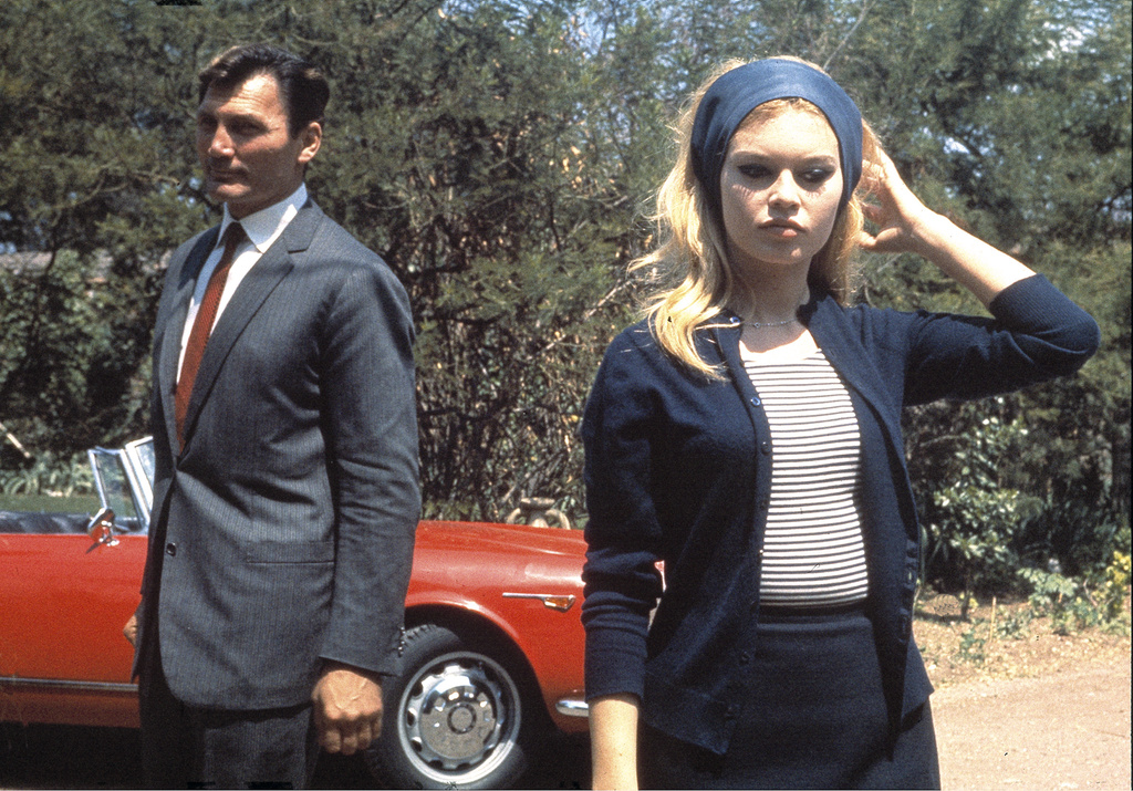 FILE - French actress Brigitte Bardot with actor Jack Palance during filming of the movie "Le Mepris" aka "Contempt", by Jean-Luc Godard, in Rome, Italy, May 1963. (AP Photo/File)