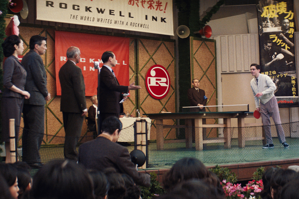 This image released by A24 shows Timothée Chalamet, right, in a scene from "Marty Supreme." (A24 via AP)