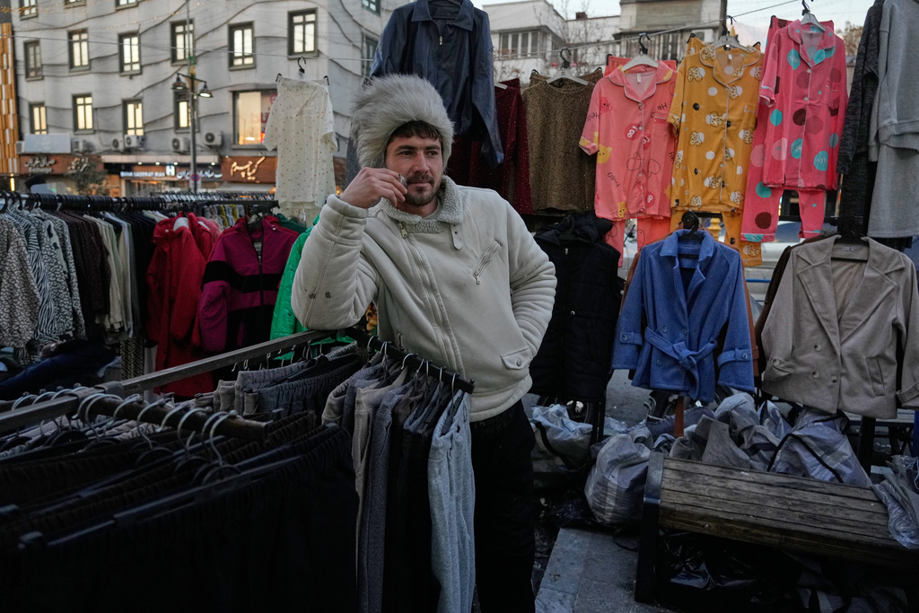 A vendor waits for customers at Tajrish Sq. in Tehran, Iran, Tuesday, Jan. 27, 2026. (AP Photo/Vahid Salemi)