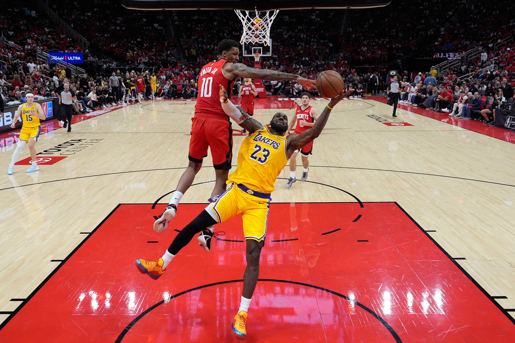 Houston Rockets forward Jabari Smith Jr. (10) defends against Los Angeles Lakers forward LeBron James (23) during the second half of Game 6 of a first-round NBA playoffs basketball series in Houston, Friday, May 1, 2026. (AP Photo/Ashley Landis)