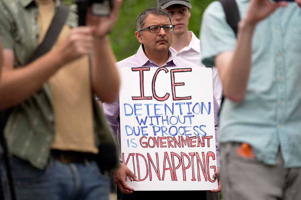 Dr. Nirav Shah, Democratic candidate for U.S. Senate, attends a protest outside a U.S. Immigration and Customs Enforcement facility Scarborough, Maine, one day after the shooting of Johan Sebastián Durán Guerrero, Tuesday, July 14, 2026. (AP Photo/Robert F. Bukaty) CORRECTION: Corrects ID to Johan Sebastián Durán Guerrero NOT Joan Sebastian Guerrero