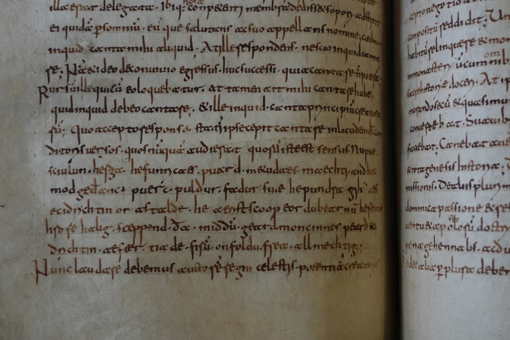 A rare, long-lost copy of Caedmon's Hymn — the first poem ever written down in Old English — is visible in the five lines above the final line of a page from an 8th-century manuscript copy of the Venerable Bede's Ecclesiastical History of the English People, at Rome's National Library, Thursday, May 8, 2026. (AP Photo/Andrea Rosa)