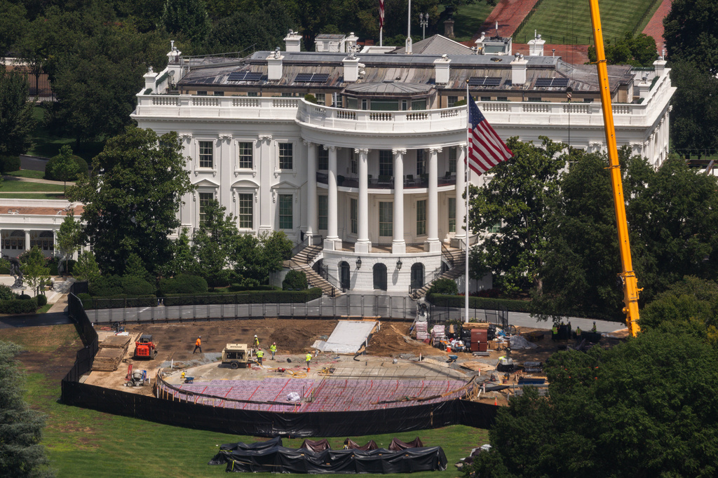 Construction continues on a helipad on the South Lawn of the White House, Wednesday, Aug. 5, 2026, in Washington. (AP Photo/Tierney L. Cross)