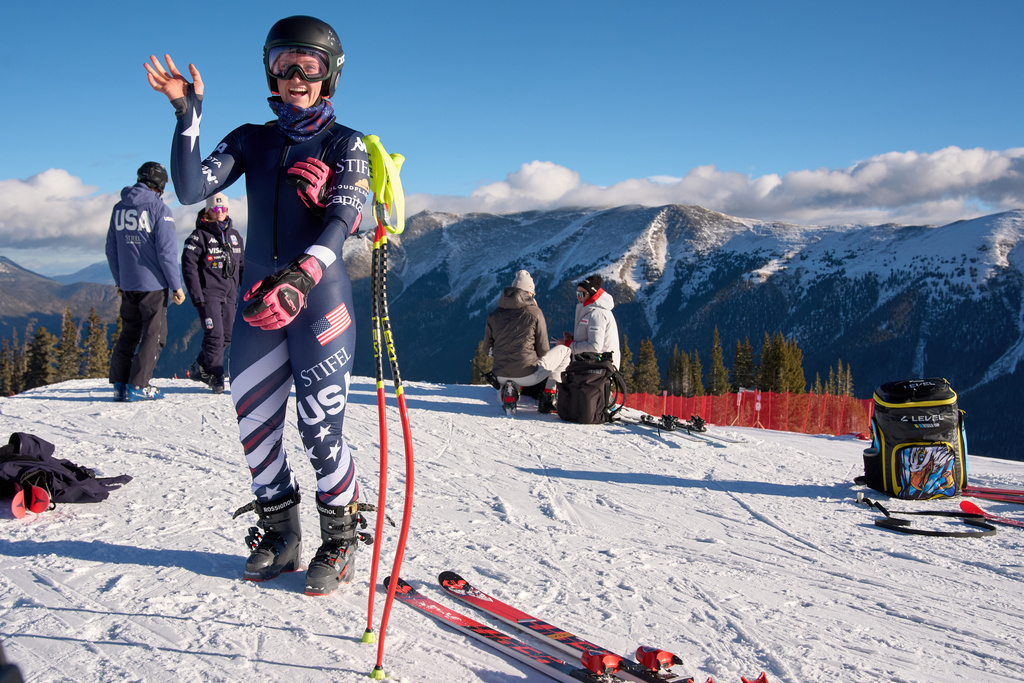 Mary Bocock waves at a teammate after arriving for practice with the U.S. Women's Ski Team at Copper Mountain, Colo., Nov. 19, 2025. (AP Photo/Jacquelyn Martin)