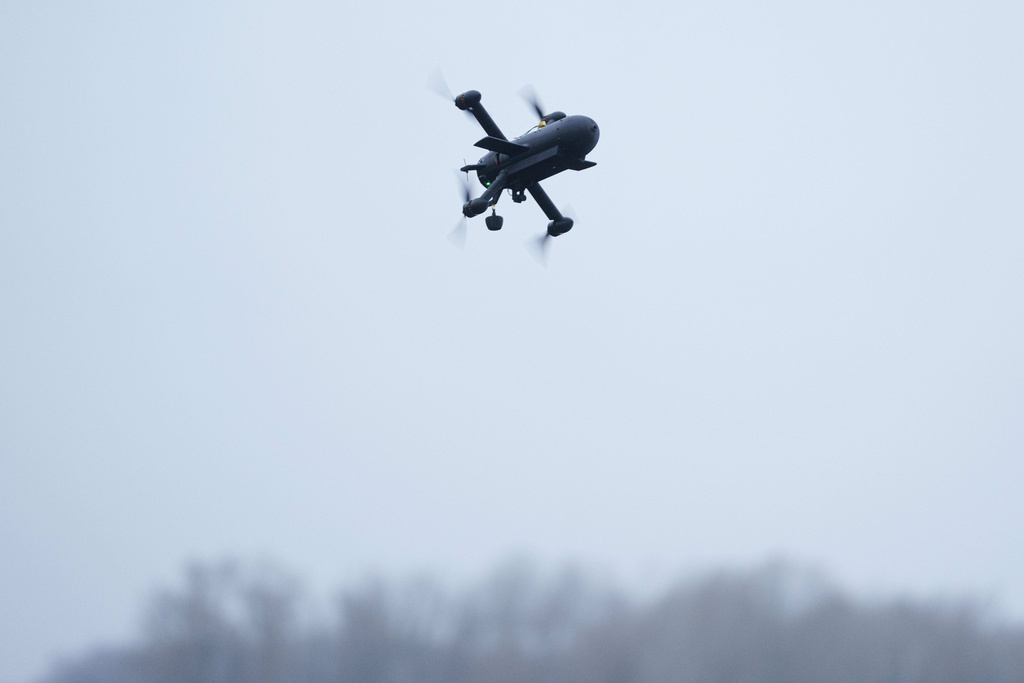 An interceptor drone of "General Cherry" company flys at the polygon in Ukraine, on Dec. 4, 2025. (AP Photo/Evgeniy Maloletka)