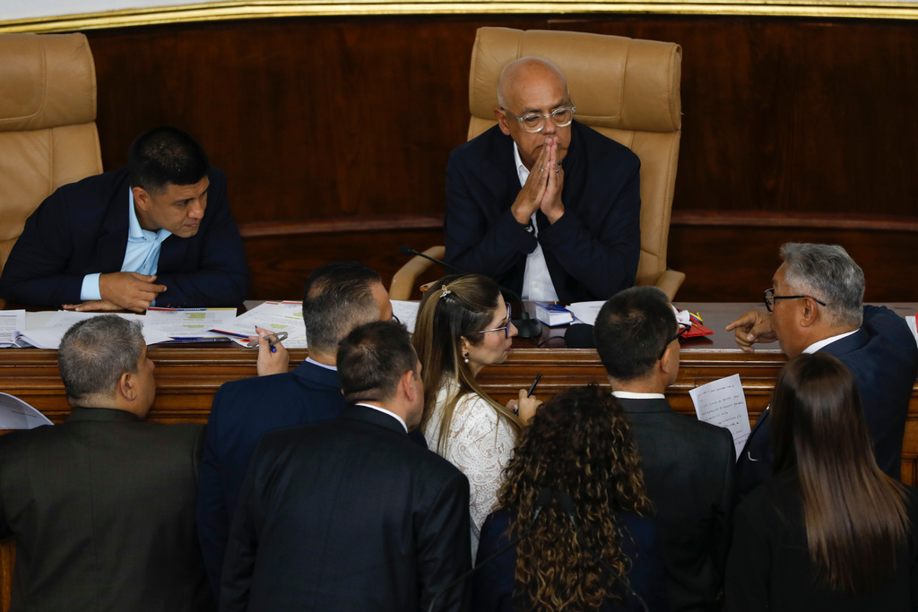 National Assembly President Jorge Rodriguez speaks with lawmakers during debate on an amnesty bill in Caracas, Venezuela, Thursday, Feb. 12, 2026. (AP Photo/Cristian Hernandez)
