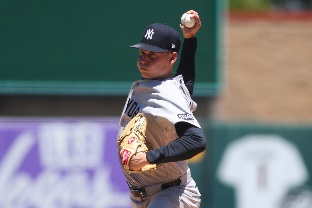 New York Yankees pitcher Will Warren throws to an Athletics batter during the first inning of a baseball game Sunday, May 31, 2026, in West Sacramento, Calif. (AP Photo/Scott Marshall)