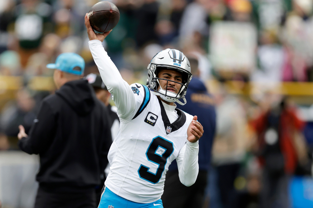Carolina Panthers quarterback Bryce Young (9) warms up before playing the Green Bay Packers in an NFL football game Sunday, Nov. 2, 2025, in Green Bay, Wis. (AP Photo/Matt Ludtke)