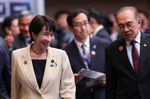 Malaysia's Prime Minister Anwar Ibrahim, right, and Japan's Prime Minister Sanae Takaichi walk during the 28th ASEAN Japan Summit, in Kuala Lumpur, Malaysia, Oct. 26, 2025. (Chalinee Thirasupa/Pool Photo via AP) Malaysia's Prime Minister Anwar Ibrahim, right, and Japan's Prime Minister Sanae Takaichi walk during the 28th ASEAN Japan Summit, in Kuala Lumpur, Malaysia, Oct. 26, 2025. (Chalinee Thirasupa/Pool Photo via AP)