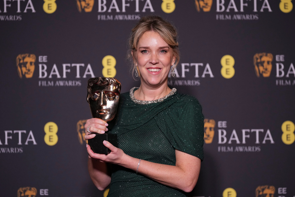 Lauren Evans poses with the award for casting for 'I Swear' at the 79th British Academy Film Awards, BAFTA's, in London, Sunday, Feb. 22, 2026. (AP Photo/Alastair Grant)