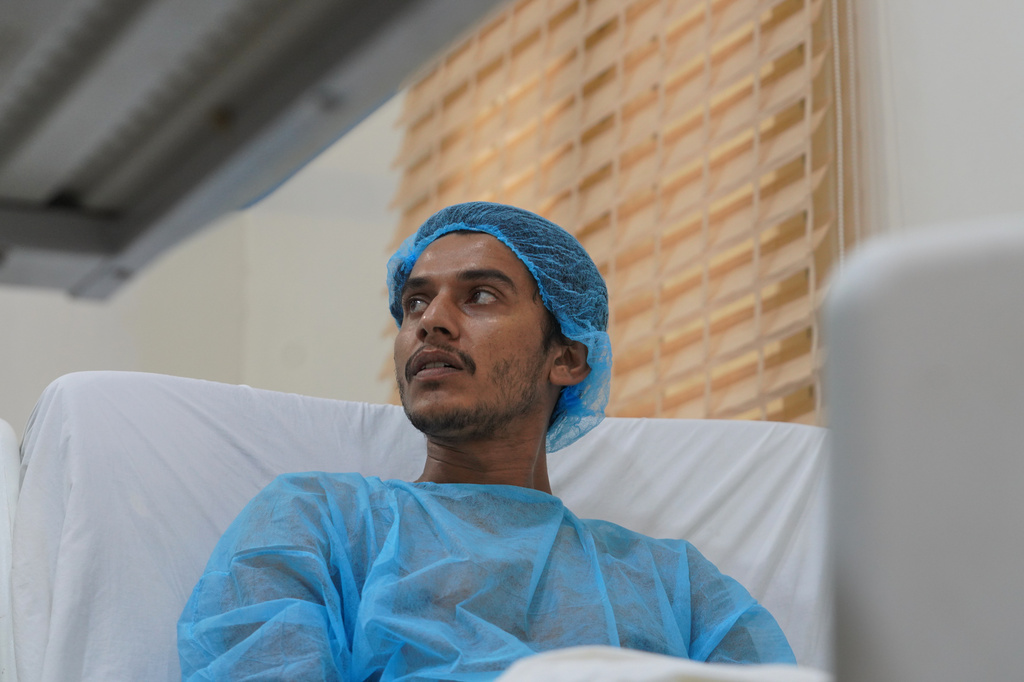Pakistani crew member Muhammad Hamza receives medical treatment at 2 December Hospital in Mokha, Yemen, Wednesday, Aug. 12, 2026, after the cargo ship Tihama was struck in a Houthi attack in the Bab al-Mandab Strait off Yemen's Dhubab district on Aug. 10, 2026. (AP Photo/Abdulnasser Alseddik)