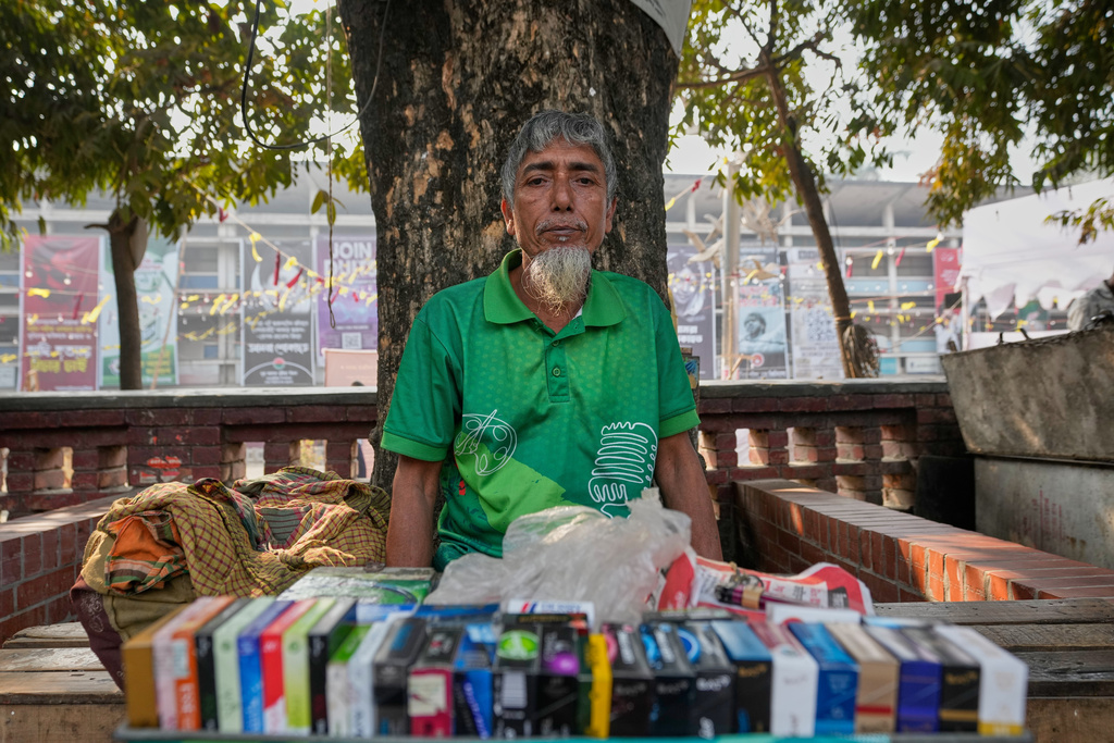 Mohammed Zainul Abedeen, 62, a tea seller vendor talks to Associated Press in Dhaka, Bangladesh, Sunday, Feb. 8, 2026. (AP Photo/Anupam Nath)