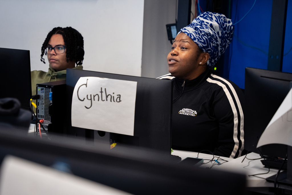 Students attend a Per Scholas class at the training center's Brooklyn campus, Monday, Oct. 20, 2025, in New York. (AP Photo/Angelina Katsanis)