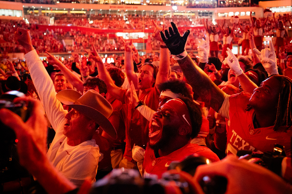 Texas Football sings "The Eyes of Texas" after defeating Ohio State 24-23 during an NCAA college football game in Austin, Texas, Saturday, Sept. 12, 2026. (Sara Diggins/The San Antonio Express-News via AP)