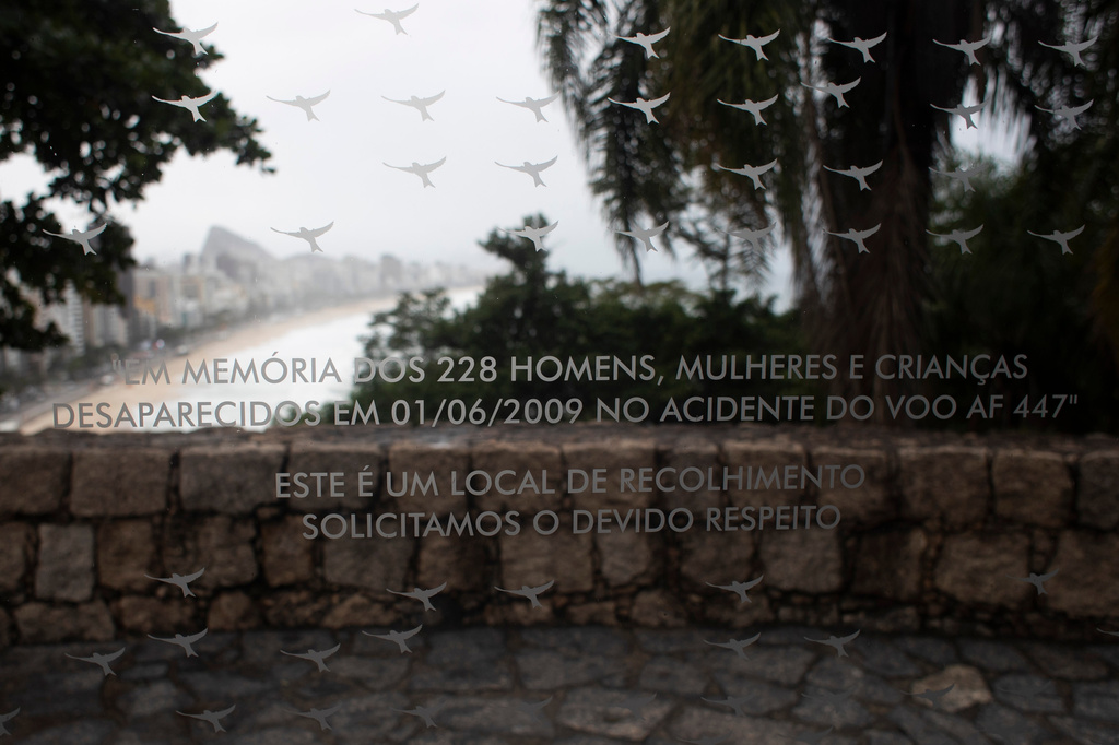 A message in Portuguese reads: "In memory of the 228 men, women and children who disappeared on 01/06/2009 in the crash of flight AF 447. This is a place of remembrance, we request due respect," on a memorial in Rio de Janeiro, Brazil, honoring the passengers who died in the crash near the coast, Thursday, May 21, 2026. (Photo AP/Bruna Prado)