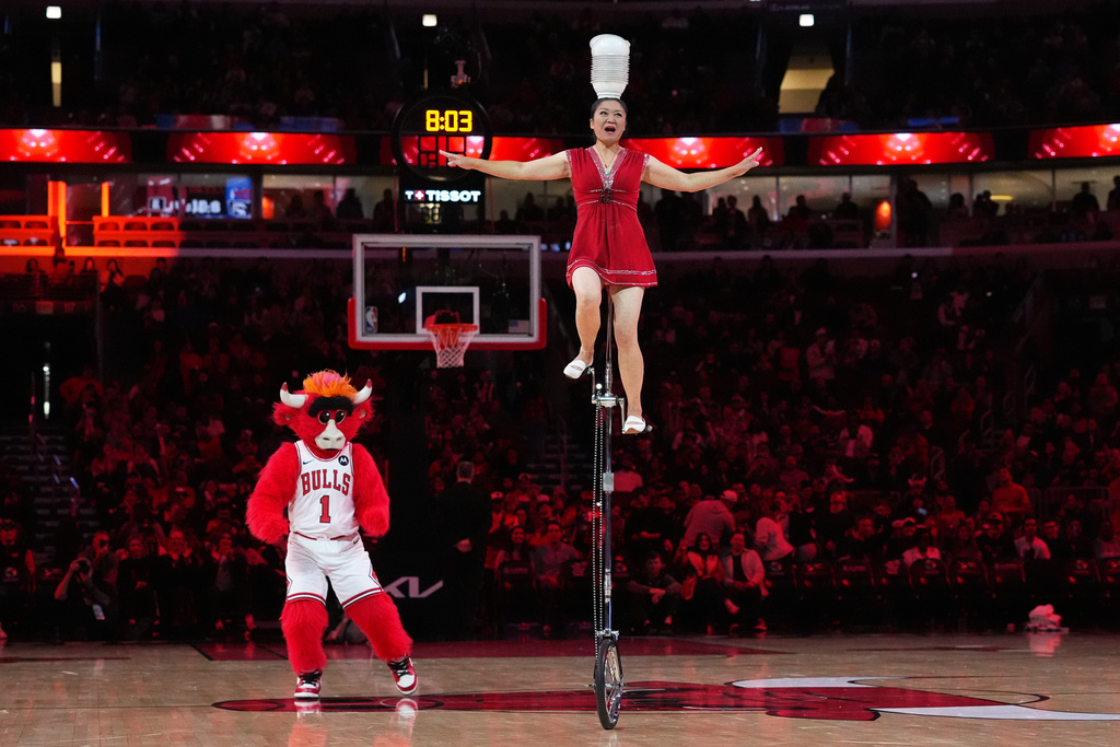 Red Panda performs in the halftime during an NBA basketball game between the Philadelphia 76ers and the Chicago Bulls in Chicago, Tuesday, Nov. 4, 2025. (AP Photo/Nam Y. Huh)