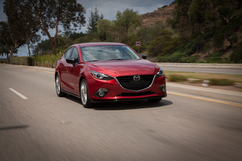 This photo provided by Mazda shows the 2016 Mazda 3, a small sedan with a sense of style to match its fun-to-drive demeanor. Buyers should look for a third-generation model produced from 2014 through 2018. (Courtesy of Mazda North American Operations via AP)