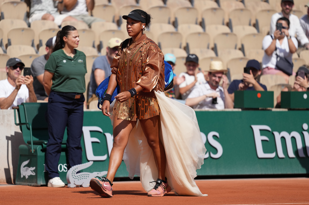 Naomi Osaka of Japan enters the court for the second round women's singles tennis match against Donna Vekic of Croatia at the French Open tennis tournament in Paris, Thursday, May 28, 2026. (AP Photo/Thibault Camus)