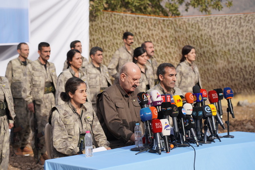 Kurdistan Workers' Party (PKK) fighters, who reportedly withdrew from Turkey with their weapons, stand to attention during a ceremony in the Qandil area of northern, Iraq, Sunday, Oct 26, 2025. (AP Photo/Rashid Yahya) Kurdistan Workers' Party (PKK) fighters, who reportedly withdrew from Turkey with their weapons, stand to attention during a ceremony in the Qandil area of northern, Iraq, Sunday, Oct 26, 2025. (AP Photo/Rashid Yahya)